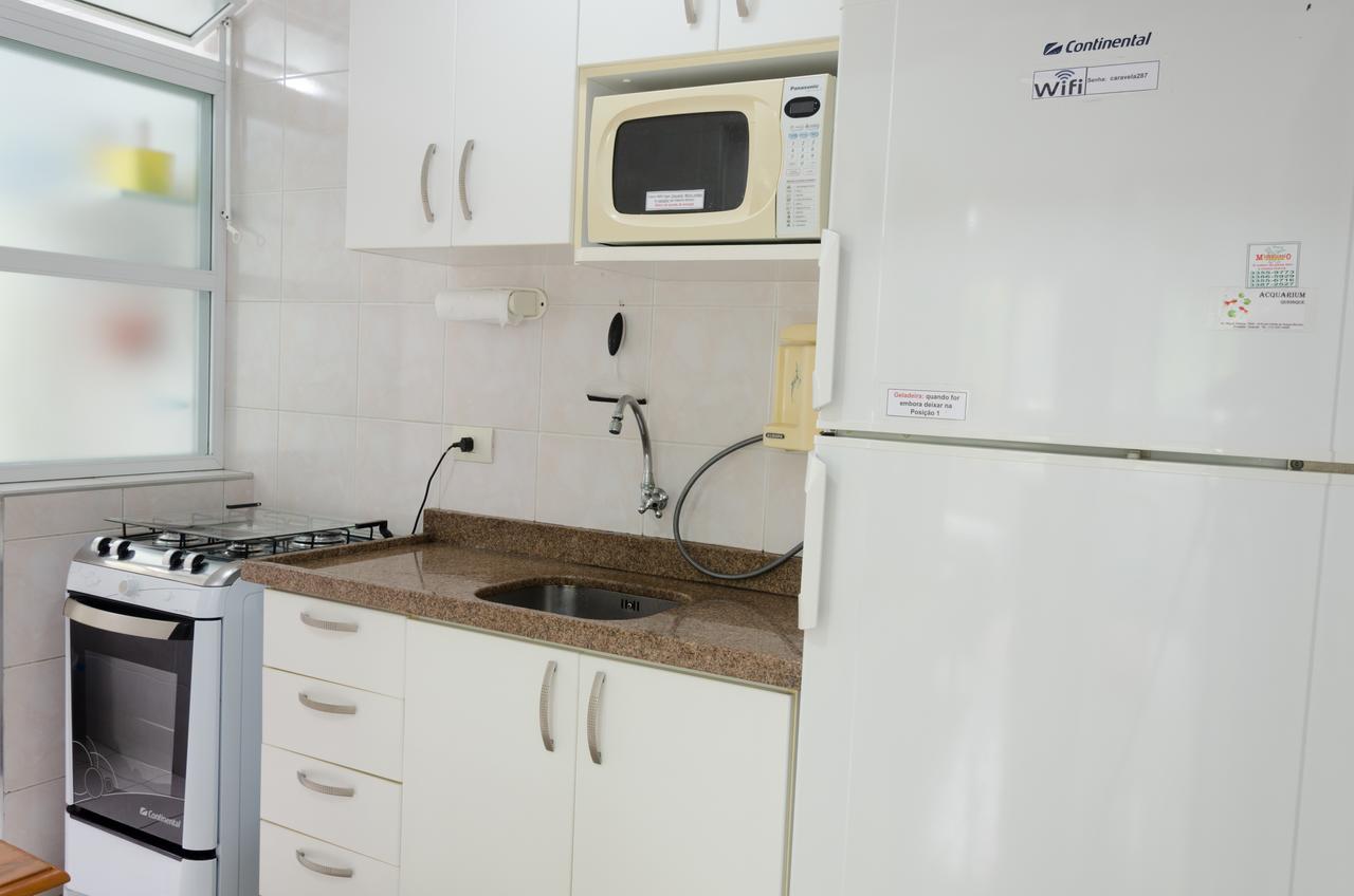 Apto com Ar condicionado a 200 m da praia - atrás do Shopping Enseada Appartamento Guarujá Esterno foto