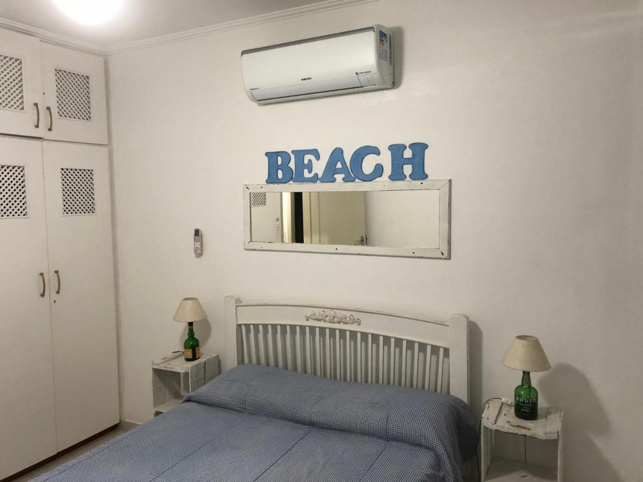 Apto com Ar condicionado a 200 m da praia - atrás do Shopping Enseada Appartamento Guarujá Esterno foto